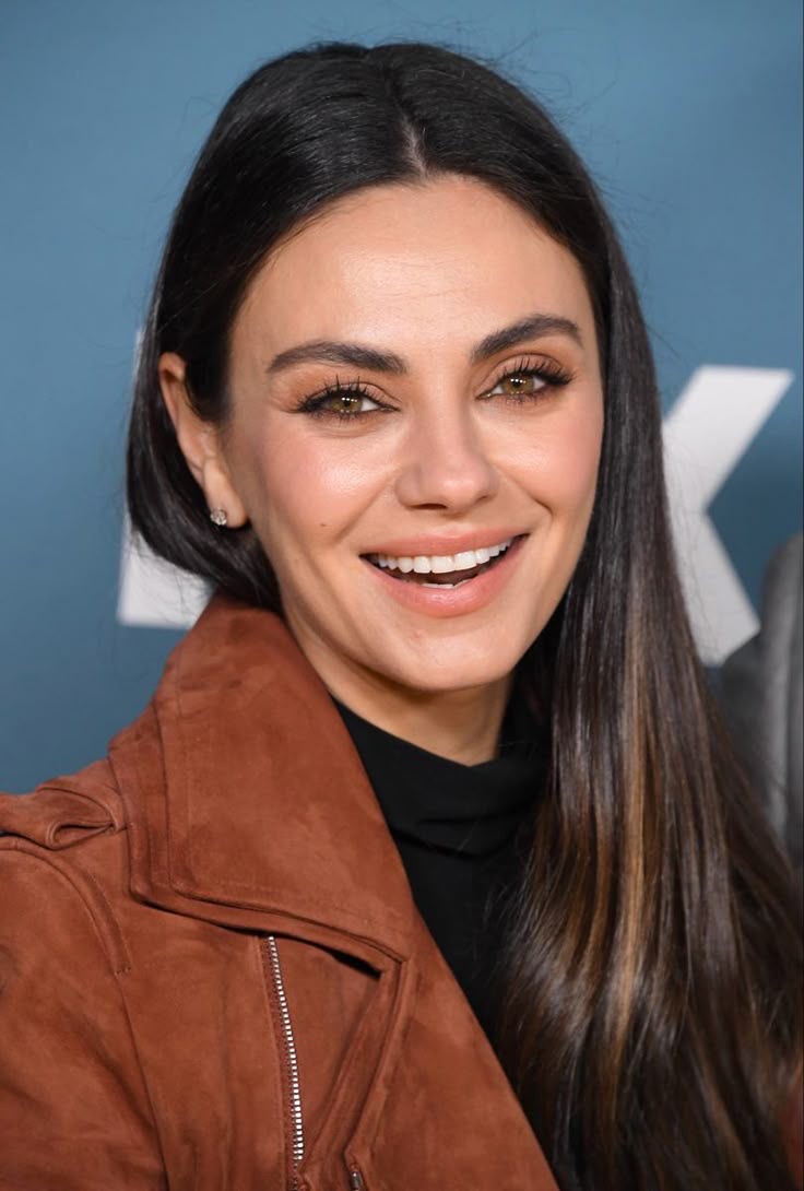 MILA KUNIS